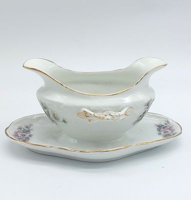 Sauce Boat in Portuguese Porcelain
. Molded and embossed, unmarked, gravy boat and presenter 