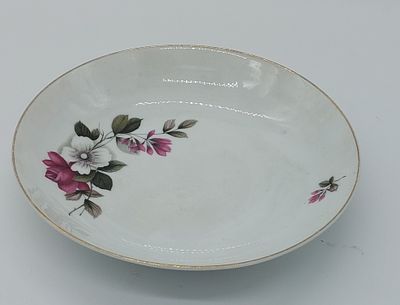 Porcelain Deep Plate
. Marked on the base Coimbra S.P. Portugal, edge edged in gold with 