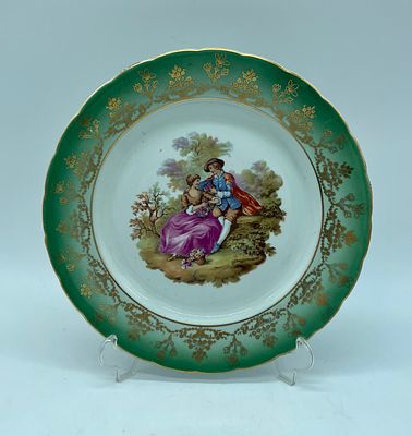 Portuguese porcelain plate. Molded and embossed Portuguese porcelain plate. Polychrome 