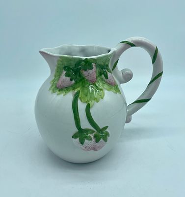 Porcelain vase. Moulded and relief porcelain vase in the shape of vines and strawberries. 