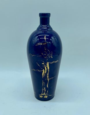 Porcelain vase. Moulded and relief porcelain vase. Painted in dark blue with gilt details and 