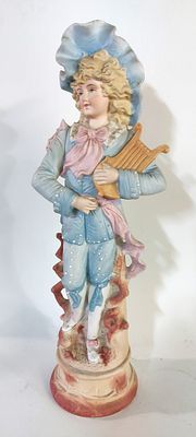 Biscuit Sculpture. European, representing an ancient lady, polychrome decoration, on a round 