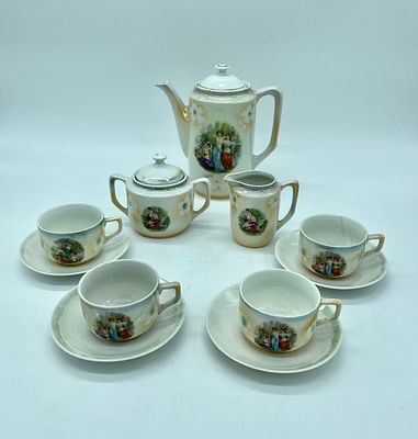 Part of a porcelain tea service. The pieces feature polychrome painting and a glazed effect. 