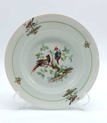Deep Plate in Portuguese Porcelain
. Molded and relief, marked on the base, faulty edge, floral 