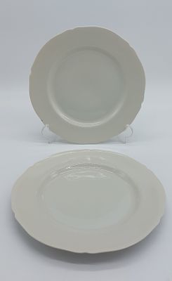 Two Decorative Plates in French Porcelain
. Molded and embossed, marked on the base, Limoges 