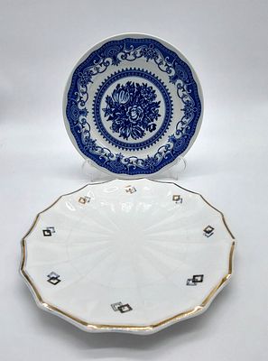 Two Portuguese Porcelain Plates
. Marked on the base, S. P. Coimbra, one plate with a faceted 