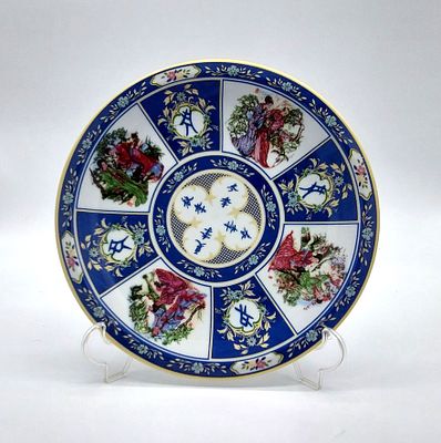 Oriental Faience Plate
. Marked on the base, floral, morphological and geometric decoration in 