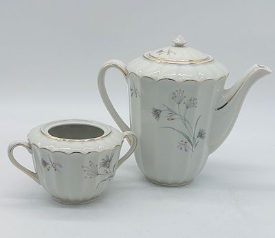 Portuguese Porcelain Teapot and Sugar Bowl
. Molded and embossed from the Candal factory, marked 