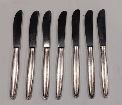 Eight WMF 90-18 Dessert Knives
. Silver-plated metal bodies, marked, brushed metal, with signs 