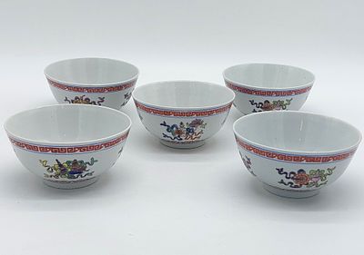 Five Chinese Porcelain Bowls
. Molded and embossed, marked on the base, with oriental-style 