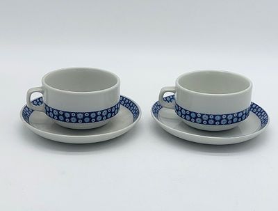 Pair of Coimbra Faience Teacups
. Molded and embossed, with markings on the base, polychrome 