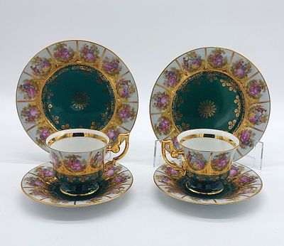 Pair of German Porcelain Teacups
. Molded and embossed, marked on the base, two cups with 