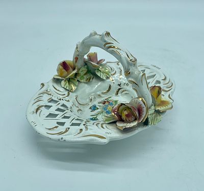 Italian porcelain basket. Moulded and embossed Italian porcelain basket with polychrome floral 
