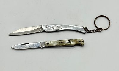 Two small pocket knives. A pocket knife advertising the Agloma brand, Oliveira do Hospital. 