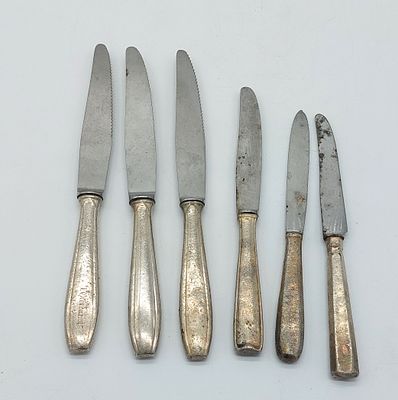 Six Knives in Silver Metal. Silver-plated metal bodies, assorted models, with signs of use as 