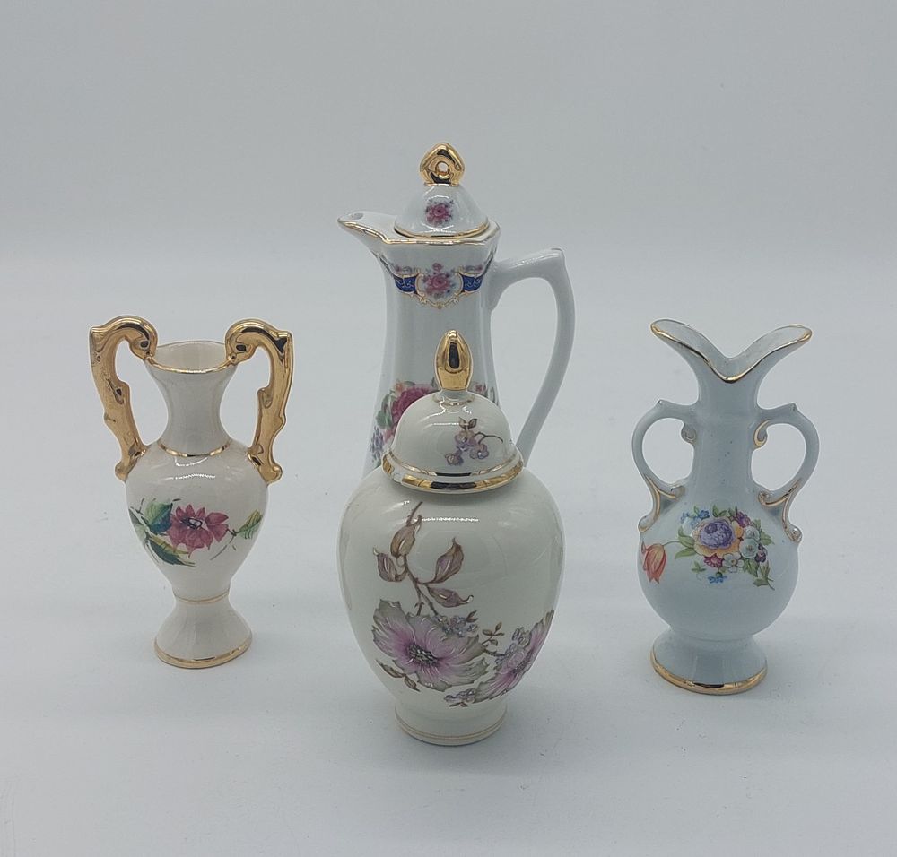 Four Pieces in European Porcelain
. Molded and embossed, marked on the base, different models 