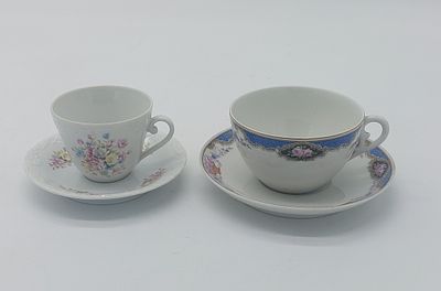 Two Portuguese Porcelain Cups
. Molded and embossed, marked on the base, Candal and Spal 