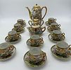 Oriental Porcelain Coffee Service
. Molded and relief, teapot, sugar bowl, milk jug and ten cups Image - 1