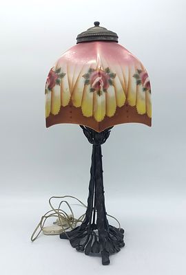 Art Nouveau Table Lamp
. Table lamp with cast iron base, pierced and raised decoration, glass 