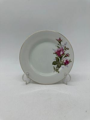 Japanese Porcelain Bread Plate
. Molded and embossed, marked on the base, made in Japan 