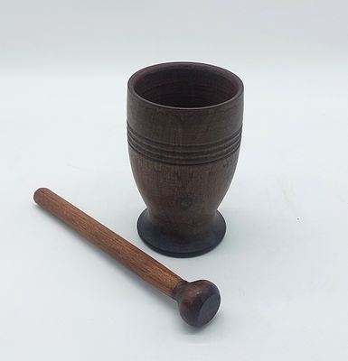 Wooden Mortar and Pestle
. Rosewood, conical body supported on a round base, in good general 