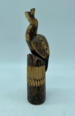 Wooden Crafts
. Wooden sculpture depicting a bird of African origin. Shows slight signs of wear 