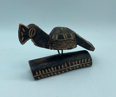 Parrot wooden statue. Wooden sculpture depicting a parrot of African origin. Shows slight signs 