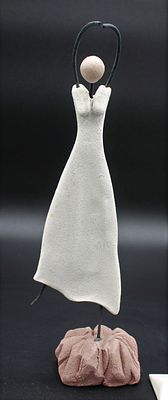 Craft Modernist Sculpture. Modernist sculpture in stone and metal powder, representing a woman 