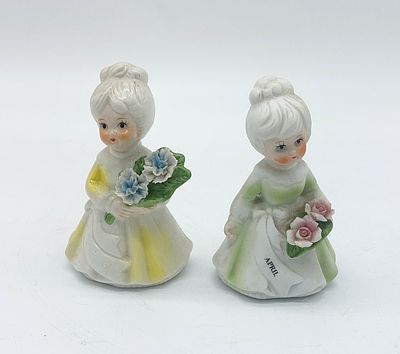 Two Porcelain Sculptures
. Molded and embossed, unmarked, sculptures representing girls with a 