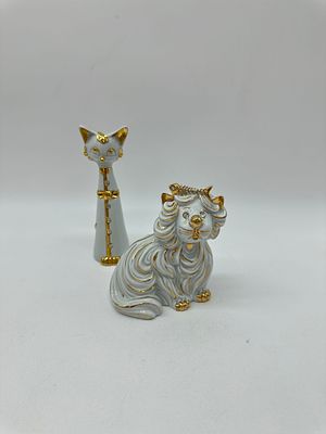 Two Porcelain Sculptures
. Molded and relief, marked on the base, Capodimonte, sculpture 