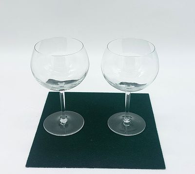 Two Crystal Balloon Glasses
. Balloon-shaped bodies supported on a cylindrical foot on a round 