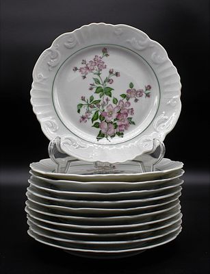 Eleven Dessert Dishes in Porcelain. Molded and relieved from the Vista Alegre factory, marked on 