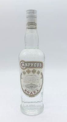 Bottle of CmnphoBb Vodka
. Translucent glass bottle, 40% volume vodka with signs of handling, as 