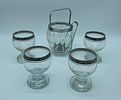 Ice Bucket and Four Glass Cups
. Ice bucket and four glass tumblers. Cylindrical bodies, ice Image - 2