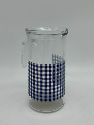 Glass Vase. Glass vase with a handle with checkered graphics in shades of blue. 20 cm high and 