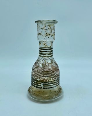 Glass solitaire with gold monochrome decoration. The piece is 20 cm high. With signs of use, as 