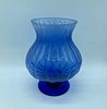 Blue glass vase. Vase with a bowl-shaped top resting on a moulded blue coloured glass base. Image - 1