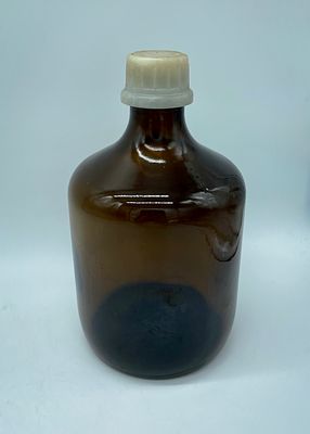 Amber glass jar. Cylindrical amber glass jar with plastic lid. It measures 14 x 27 cm and is in 