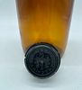 glass bottle. Amber glass cylindrical bottle with plastic cap. Manufactured by E. Merck Image - 2