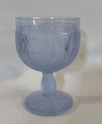 Tall Glass Bowl
. Frosted purple glass body in a conical shape, with distinctive embossed floral 