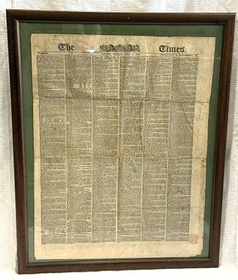 Framed The Times Newspaper
. Square-shaped body, wooden frame, with a newspaper page from The 