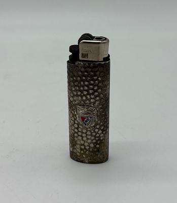 Sport Lisboa e Benfica lighter. Lighter with moulded and textured metal cover, with colourful 