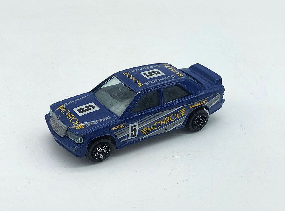 Miniature Mercedes 190 E
. Burago brand, 1/43 scale, made in Italy, with slight signs of 