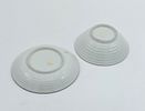 Porcelain Cup and Plate
. Molded and embossed, with a gilded rim and monochrome floral Image - 2