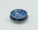 Porcelain Cup and Plate
. Molded and embossed, with a gilded rim and monochrome floral Image - 3