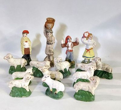 Fifteen Sculptures in Earthenware
. Earthenware body depicting men and animals on round bases 
