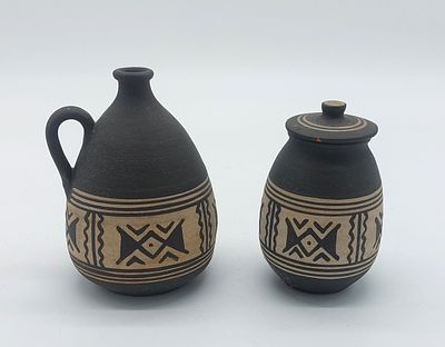 Pot and Jug in Portuguese Earthenware
. Marked on the base, Cunha Portugal, bulbous shaped 