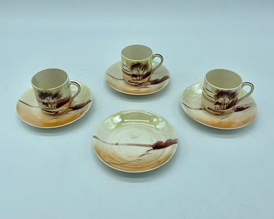 Three porcelain cups and saucers
. Three cups and four saucers in porcelain. Polychrome 