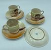 Three porcelain cups and saucers
. Three cups and four saucers in porcelain. Polychrome Image - 2