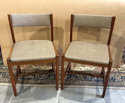 Pair of Wooden Chairs
. Chairs made of mahogany wood with back and seat upholstered in checkered 